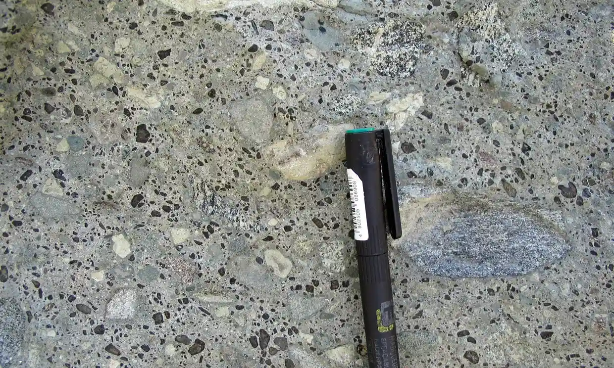 Diamond bearing rock (kimberlite) showing dark crystals (olivine) and fragments of rock formed during explosive volcanic eruptions. Photograph: Dr Tom Gernon/University of Southampton/PA