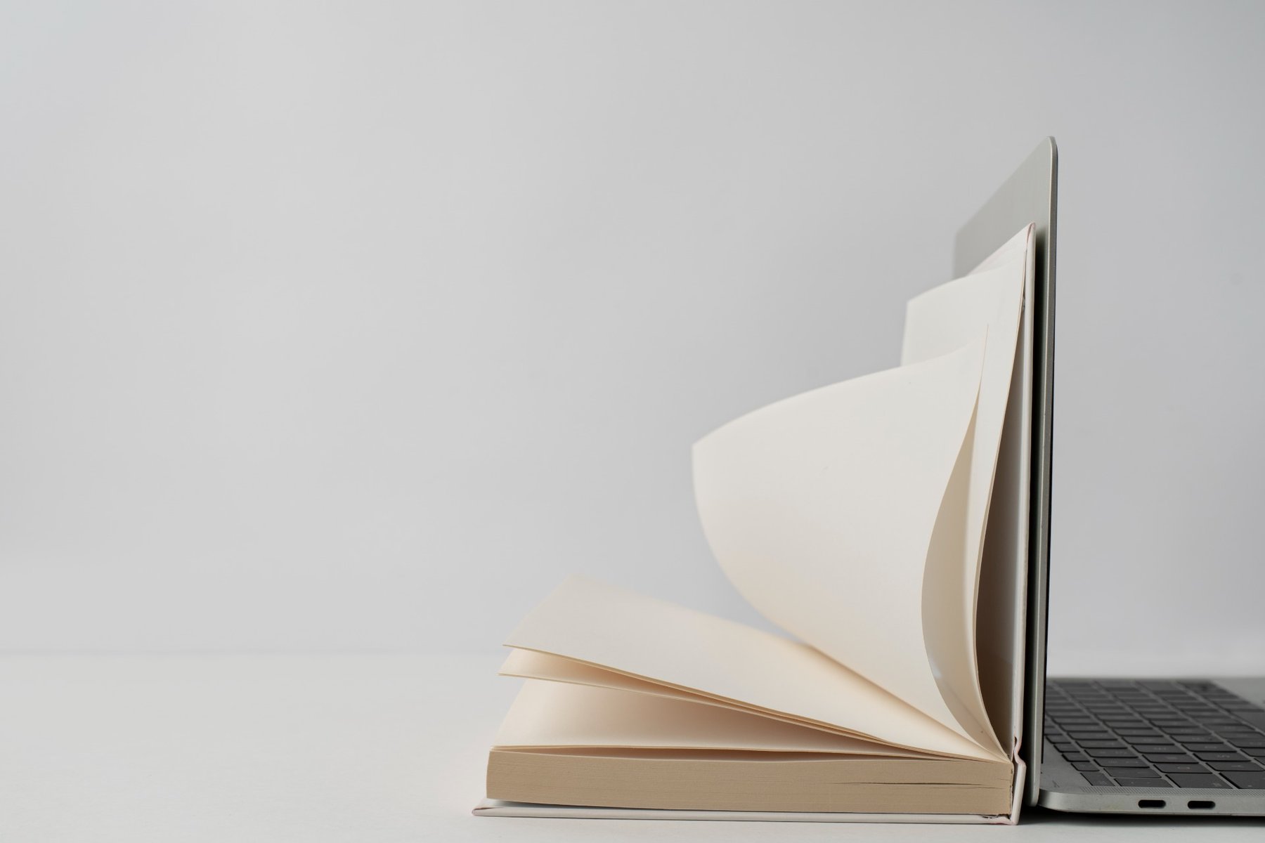 laptop-open-book-arrangement